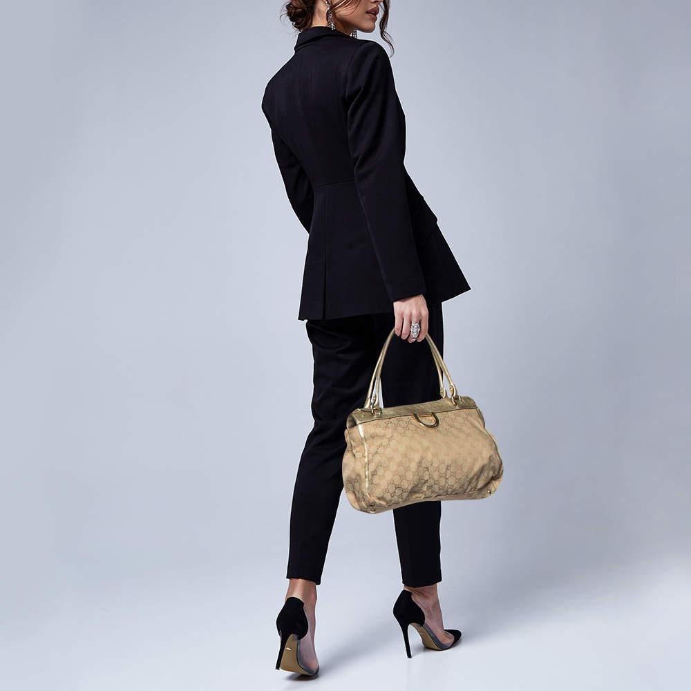 Thoughtful details  high quality  and everyday convenience mark this designer bag for women by Gucci. The bag is sewn with skill to deliver a refined look and an impeccable finish.