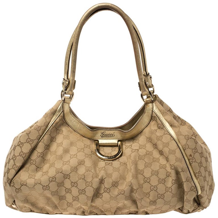 Gucci Beige/Gold GG Canvas and Leather Large D Ring Shoulder Bag at 1stDibs  | gucci d ring, gold shoulder bags
