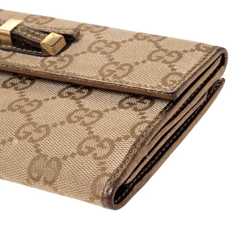 Gucci Beige/Gold GG Canvas and Leather Mayfair Bow Continental Wallet In Good Condition In Dubai, Al Qouz 2