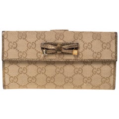 Gucci Beige/Gold GG Canvas and Leather Mayfair Bow Continental Wallet