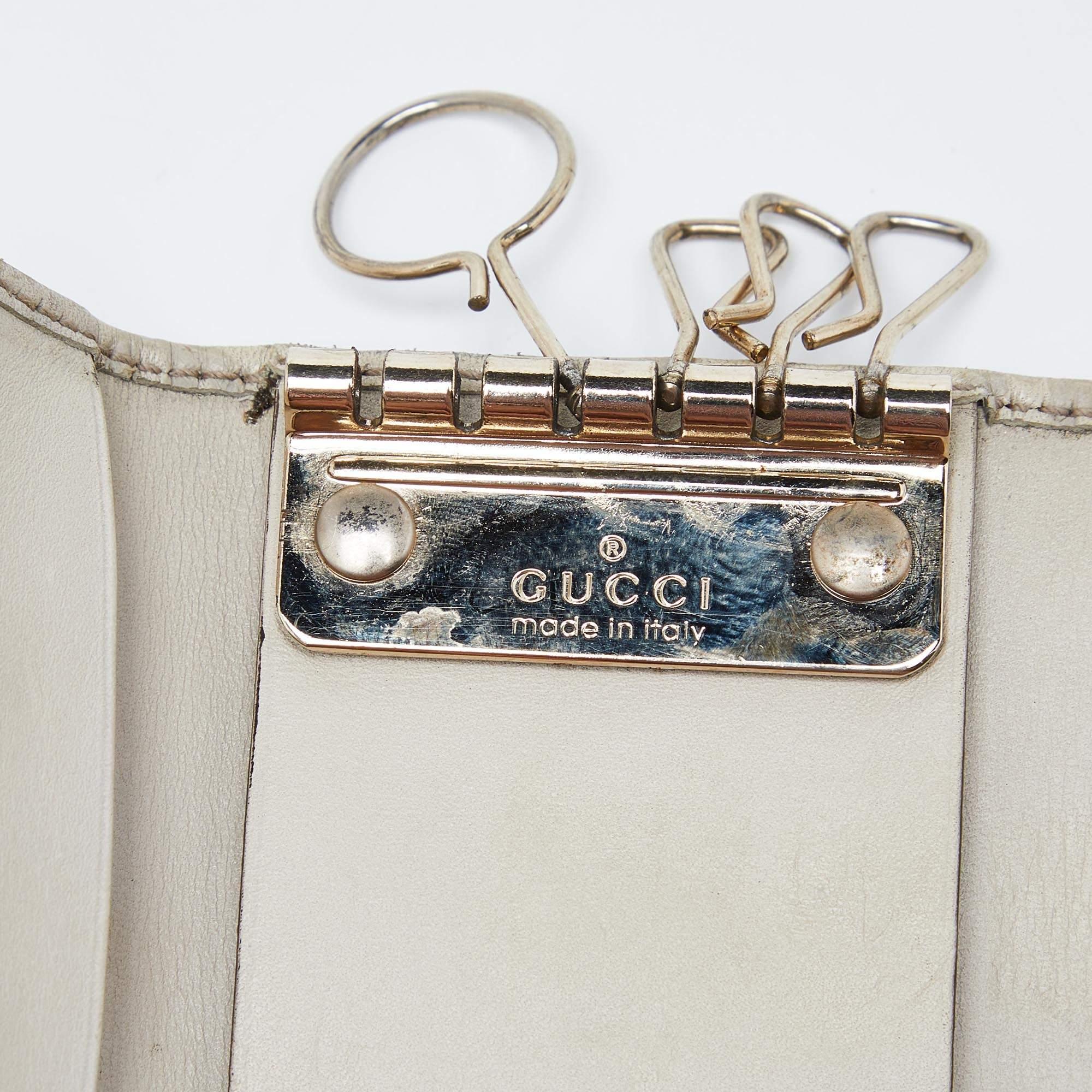 Gucci Beige Guccissima Leather Bow 6 Key Holder In Fair Condition For Sale In Dubai, Al Qouz 2