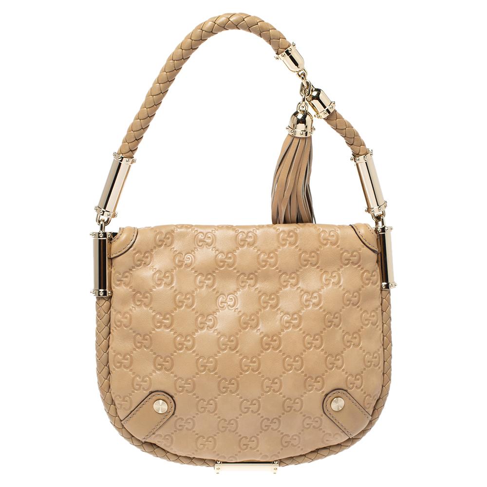 Visually appealing and incredibly stylish is this classic bag by Gucci is a must-have! Rendered in Guccissima leather, this fashionable piece is all you need to flaunt your style this season. It is complete with a spacious canvas interior and a