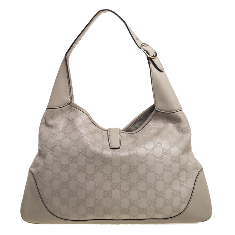 A handbag should not only be good-looking but also durable, just like this pretty Jackie O tote from Gucci. Crafted from Guccissima leather, this gorgeous number has the signature closure that opens up to a spacious canvas-lined interior. Complete