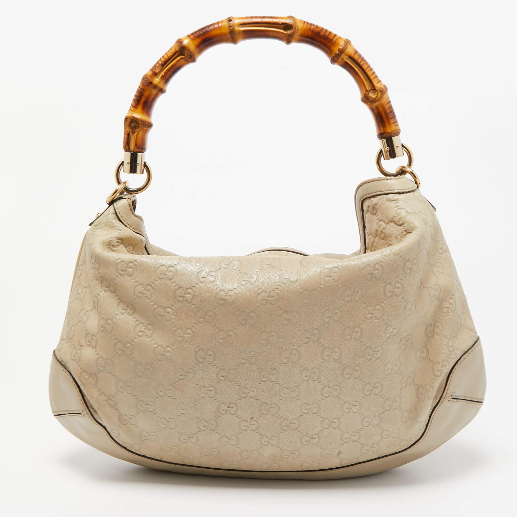 Handbags as fabulous as this one are hard to come by. So, own this gorgeous Gucci Peggy bag today and light up your closet! Crafted from Guccissima leather, this stunning number has a spacious fabric interior and is held by a wonderfully created