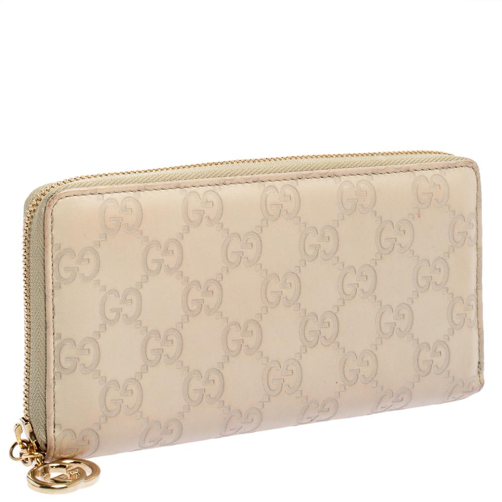Portafoglio Gucci Beige Guccissima in pelle con zip In condizioni buone a Dubai, Al Qouz 2