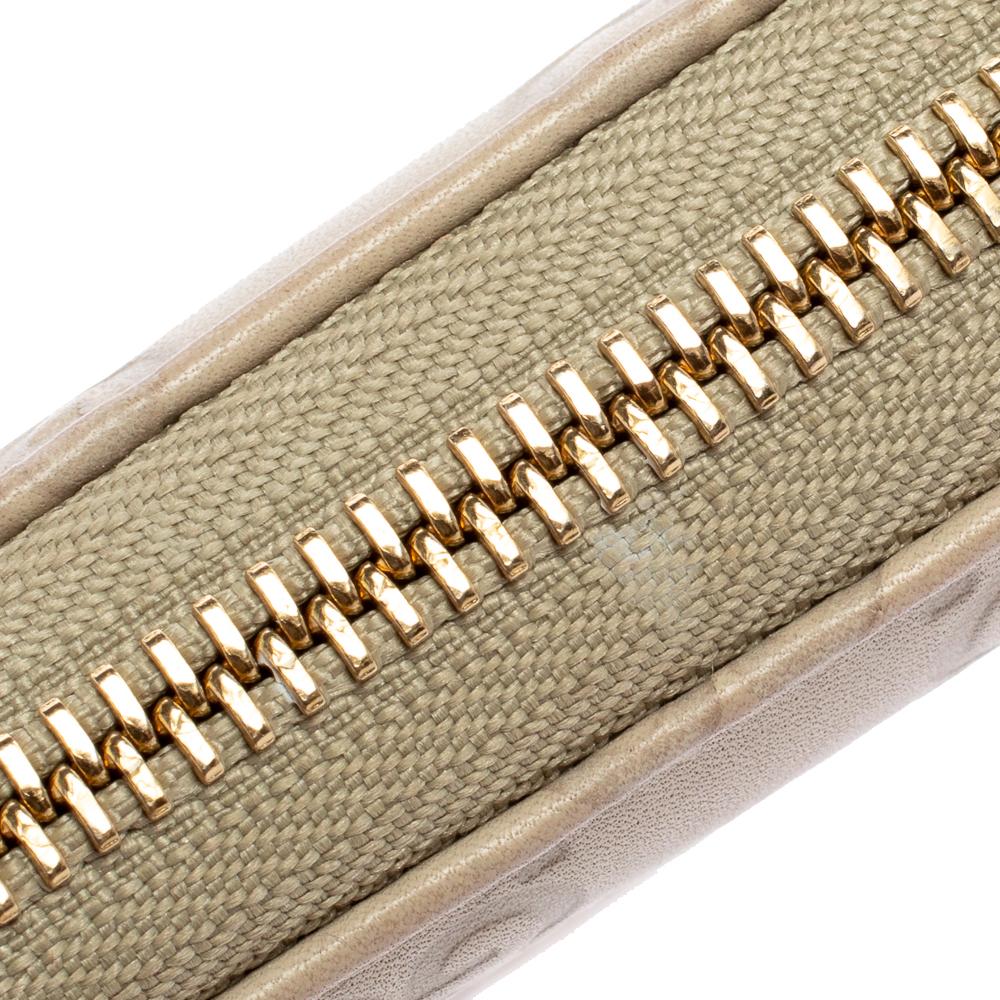 Portafoglio Gucci Beige Guccissima in pelle con zip 1