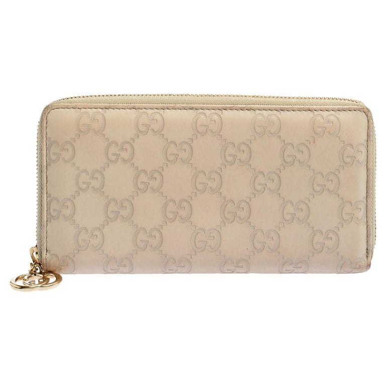 Gucci Beige Guccissima Leather Zip Around Wallet For Sale at 1stDibs