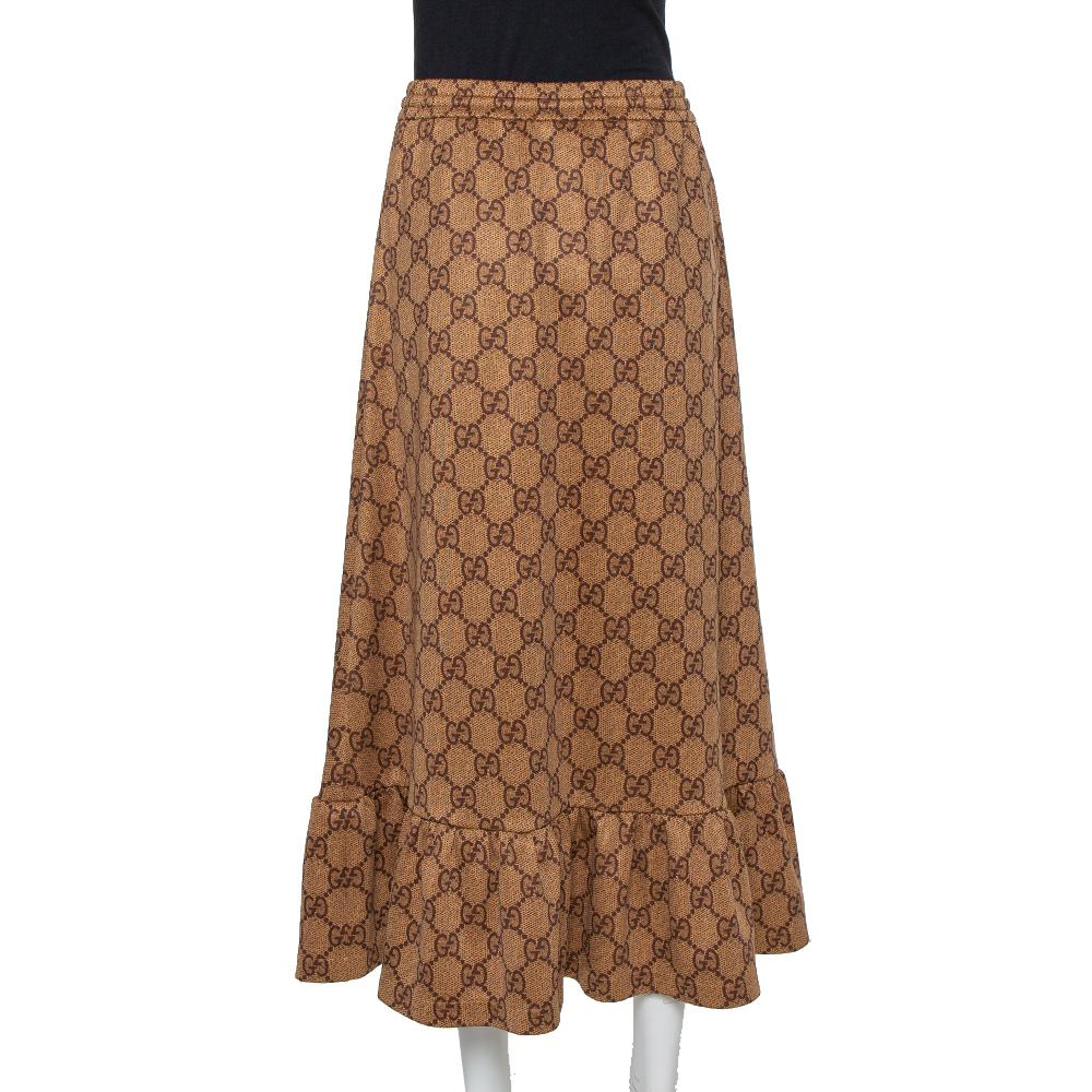 How lovely and enchanting does this skirt from Gucci look! The midi skirt is made from monogram detailed knit and features striking ruffle detailing. Assemble this creation with a vibrant top and block heels for a winning look.

