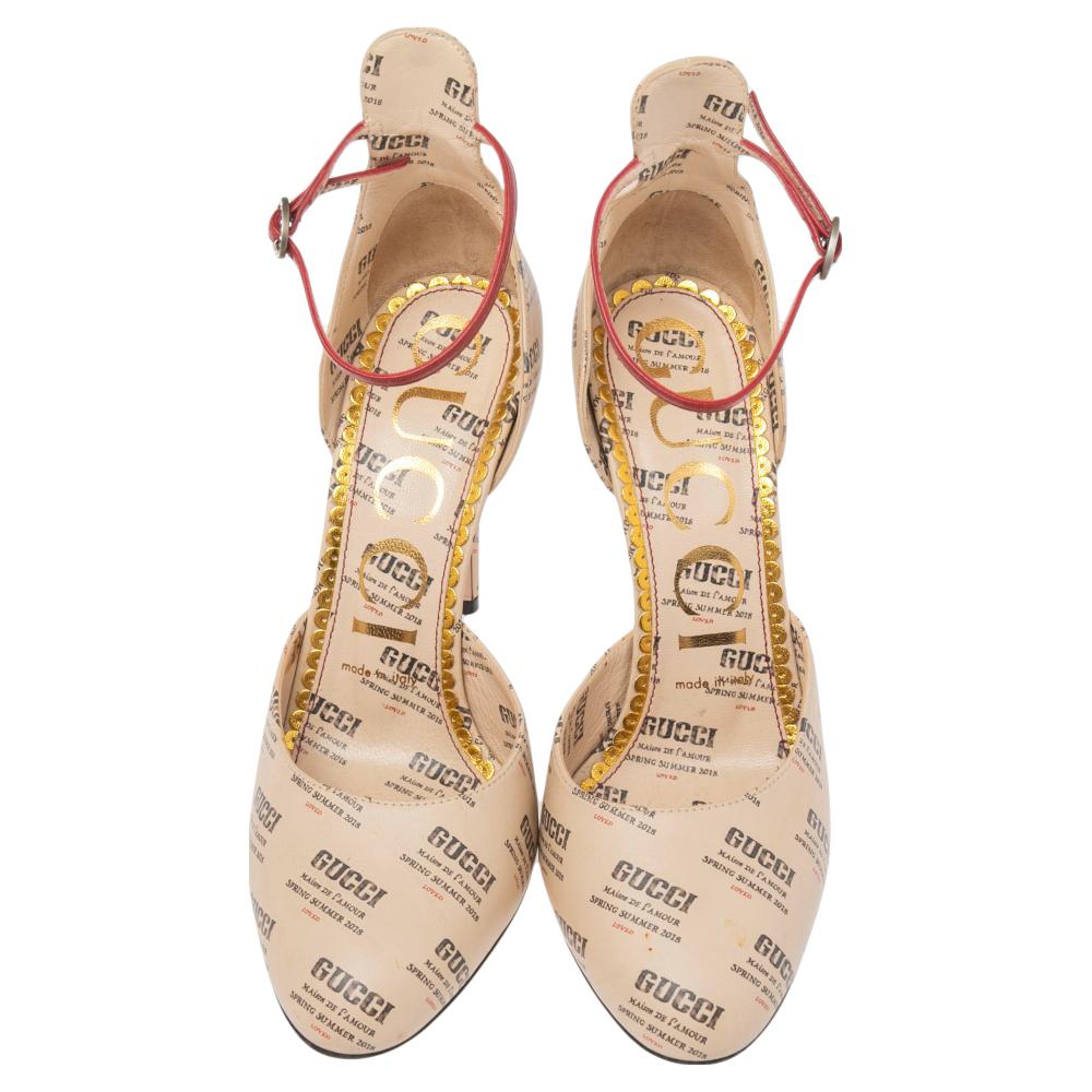 These sandals from Gucci are a beauty to behold. They are beautifully designed using beige Apollo Logo printed leather with a contrasting ankle strap and silver-toned hardware. Classy in their appearance and style, these Gucci sandals keep your feet