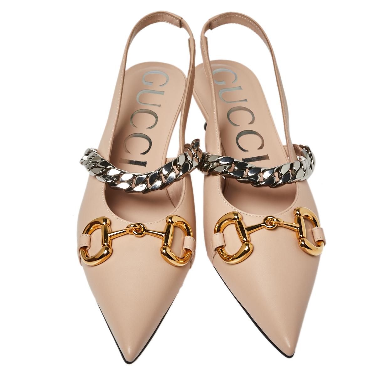 Simply luxe, these sandals from Gucci will help you stay comfortable throughout the day! The beige sandals are crafted from leather and designed with pointed toes and slingbacks. They flaunt chain & Horsebit detailing on the uppers and come equipped