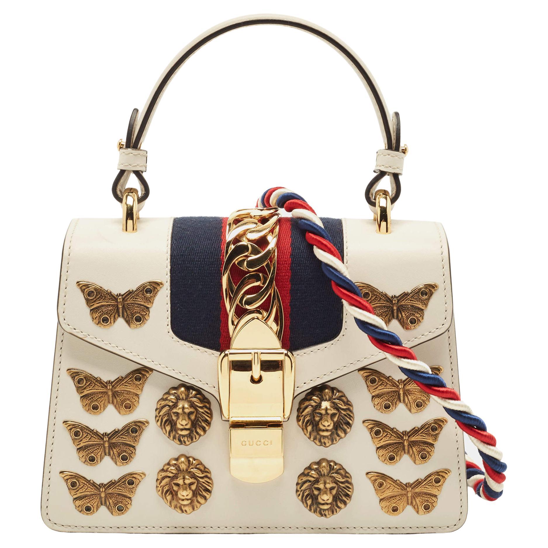 Gucci - Mini sac à main en cuir beige orné de clous Sylvie avec poignée  supérieure sur 1stDibs