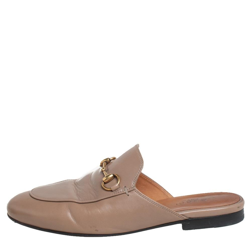 First introduced as part of Gucci's Fall Winter 2015 collection, the Princetown mules are an absolute favorite worldwide and have been worn by countless celebrities. These mules have been designed in beige leather and detailed with the signature