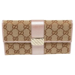 Gucci Beige/Metallic GG Canvas and Leather Flap Continental Wallet