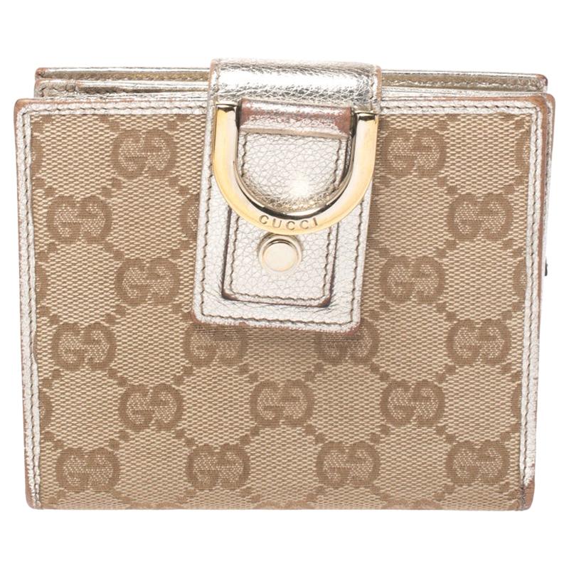 Gucci - Portefeuille compact Abbey D Ring en toile beige/or métallique GG