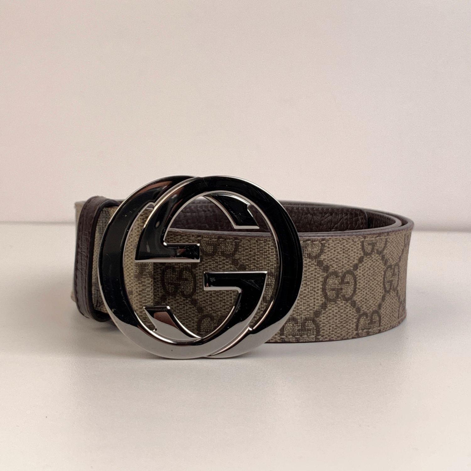 Gucci beige monogram canvas belt. Silver metal GG buckle. Width: 1.5 inches - 3,8 cm. 'GUCCI - Made in Italy' engraved on the reverse of the belt, serial number engraved on the reverse of the belt. Size: 95/38 (it should correspond to a 42 IT Women