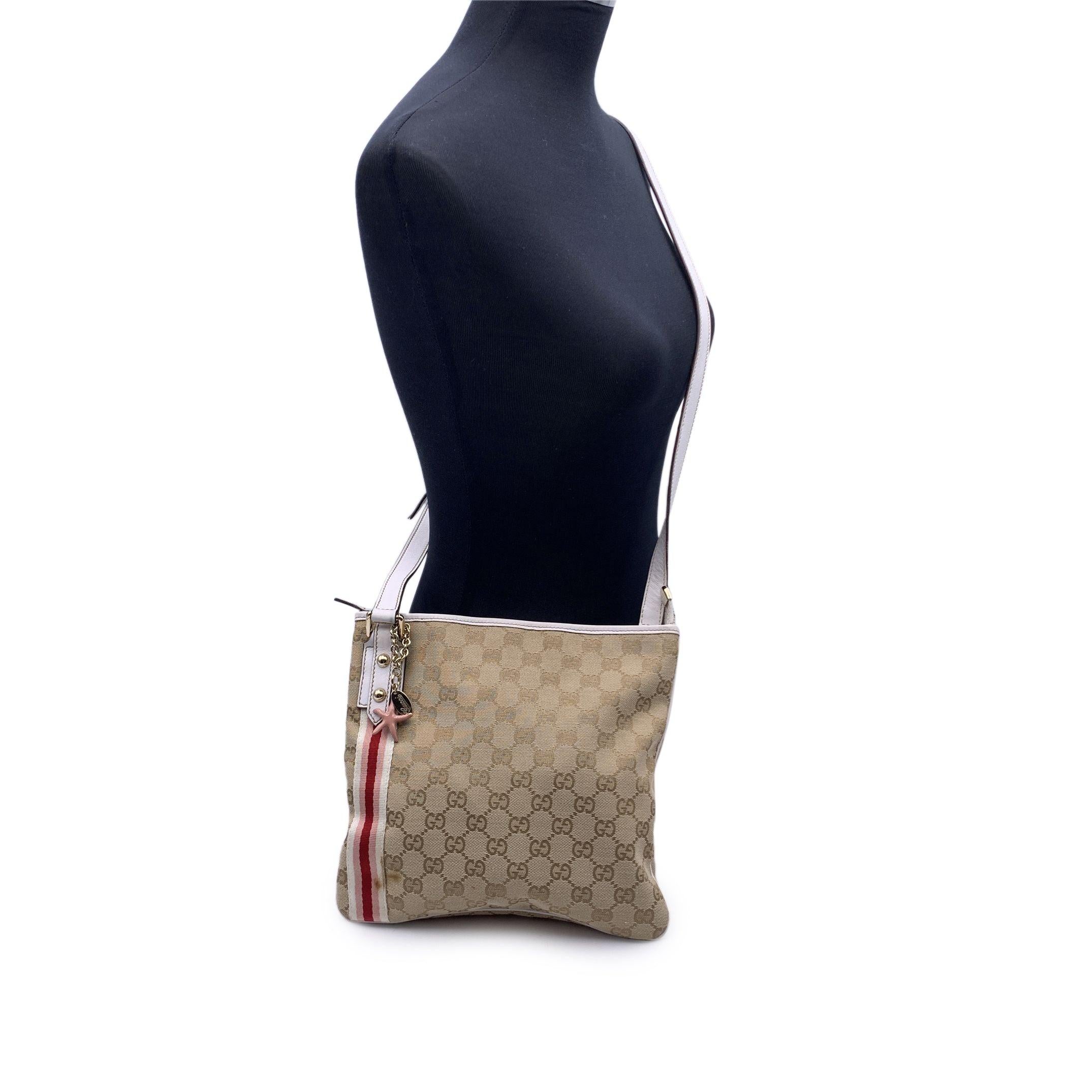 This beautiful Bag will come with a Certificate of Authenticity provided by Entrupy. The certificate will be provided at no further cost. Gucci monogram 'Jolicoeur' messenger bag, crafted in beige GG - GUCCI monogram canvas with white leather trim.