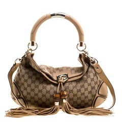 Gucci Beige Monogram Canvas Medium Indy Top Handle Bag