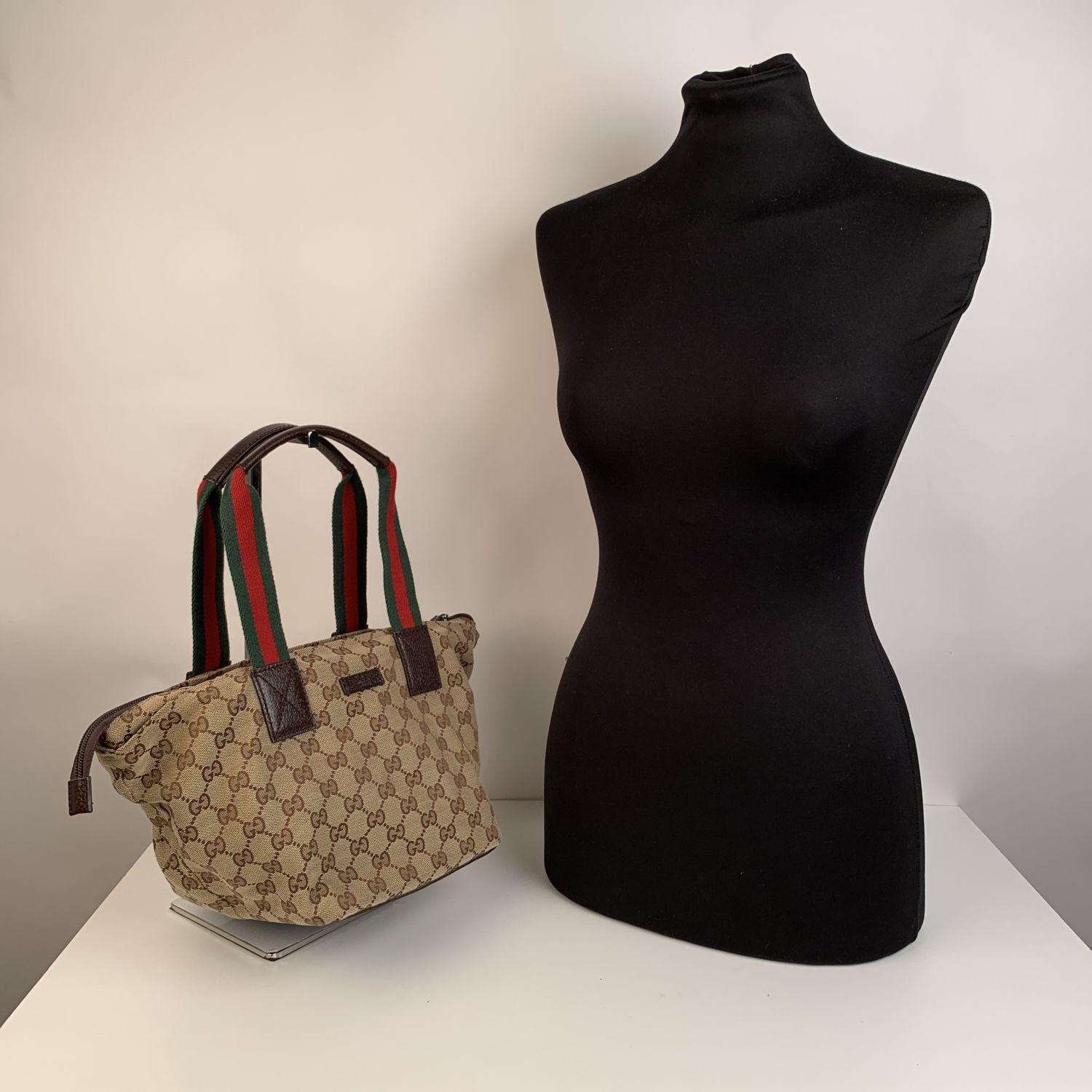 We offer Certificate of Authenticity provided by Entrupy for this item at no further cost.

Beautiful Gucci monogram small tote bag, crafted in beige GG - GUCCI monogram canvas with dark brown leather trim and Green/Red/Green canvas handles. Upper