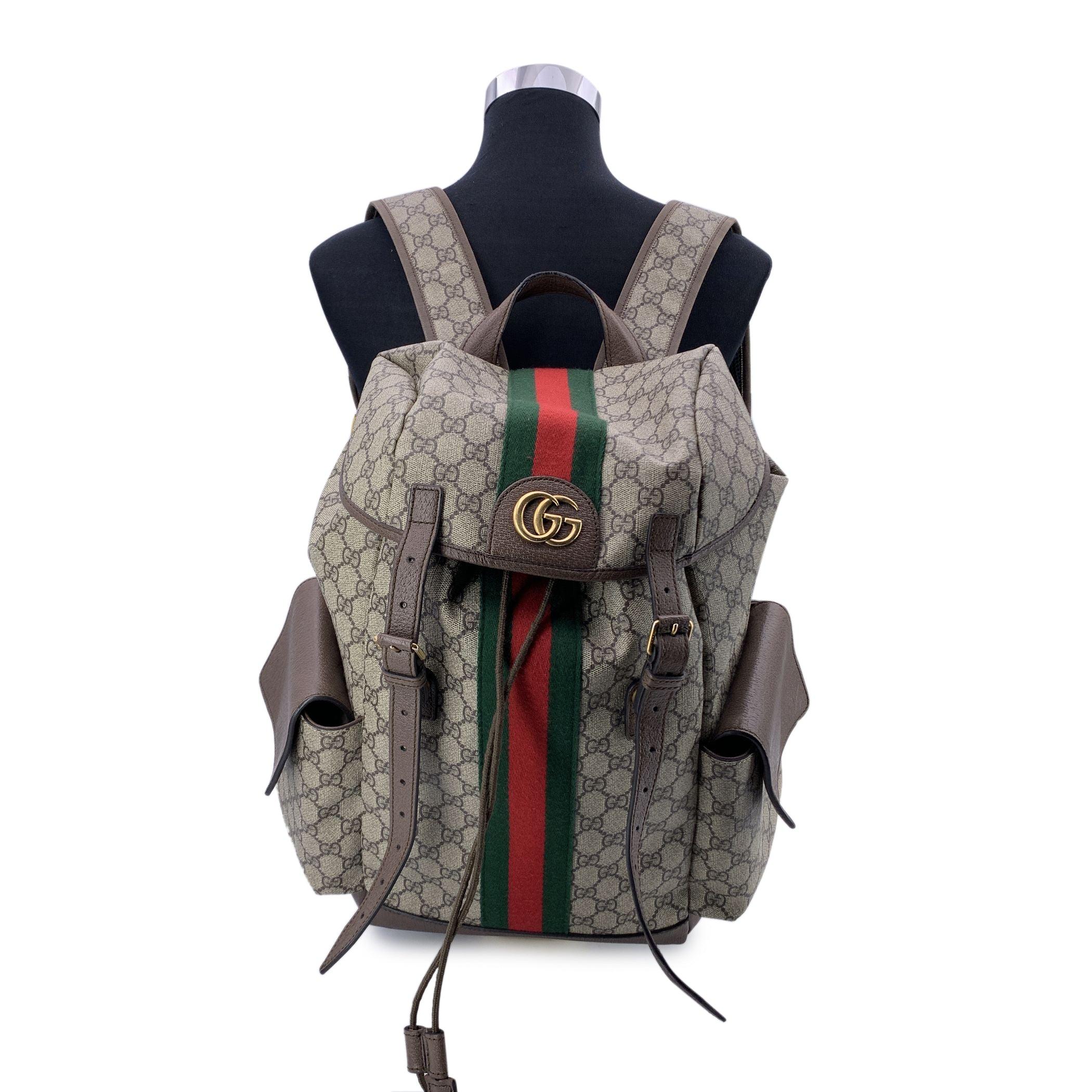 This beautiful Bag will come with a Certificate of Authenticity provided by Entrupy. The certificate will be provided at no further cost. Introducing the Gucci Ophidia Backpack, a stunning fusion of modern design and iconic heritage. This backpack