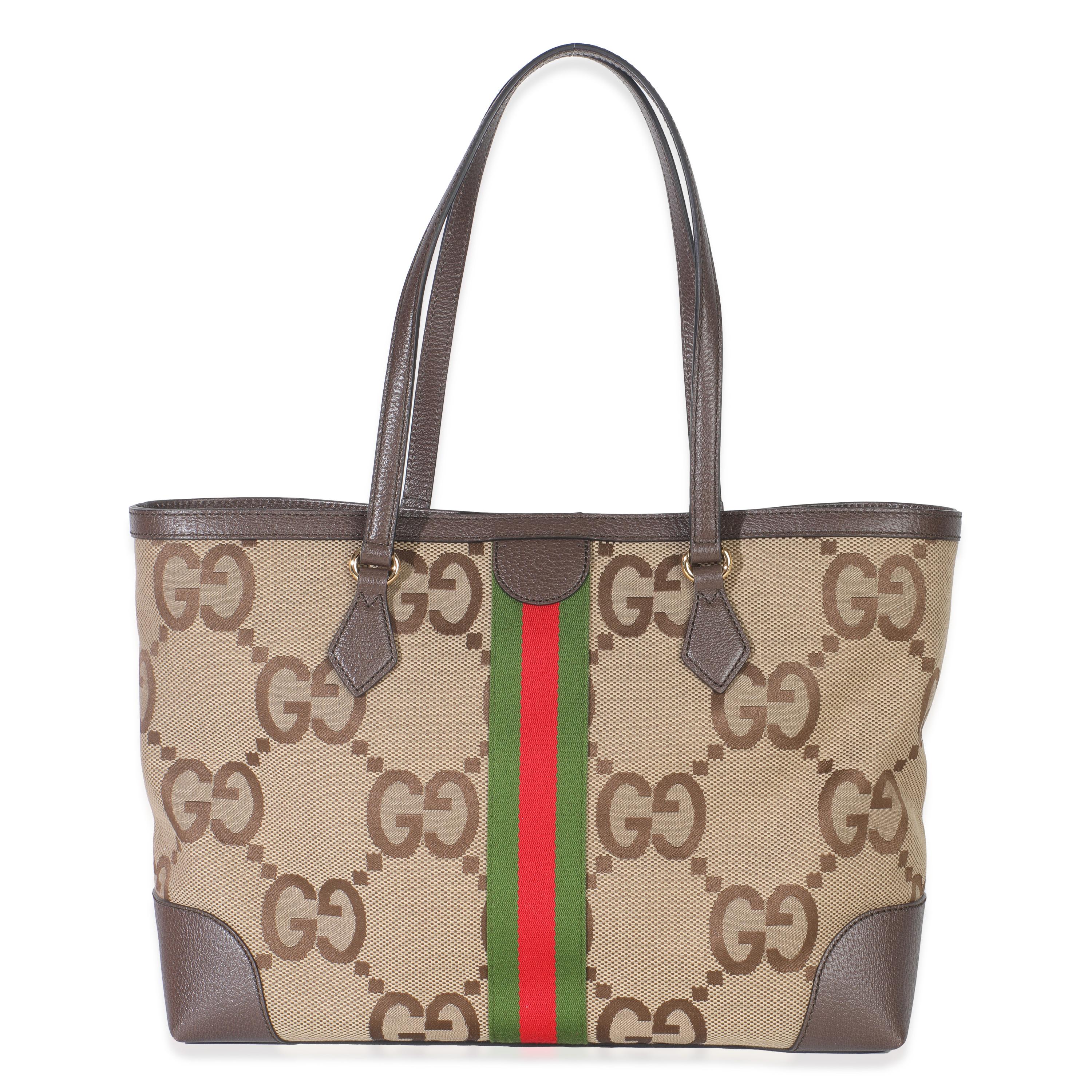 Listing Title: Gucci Beige Monogram Jumbo GG Textured Calfskin Web Medium Ophidia Shopping Tote
SKU: Z149841
MSRP: 1880.00 USD
Condition: Pre-owned 
Condition Description: Making its debut for Cruise '18, the Ophidia line-up from Gucci takes its