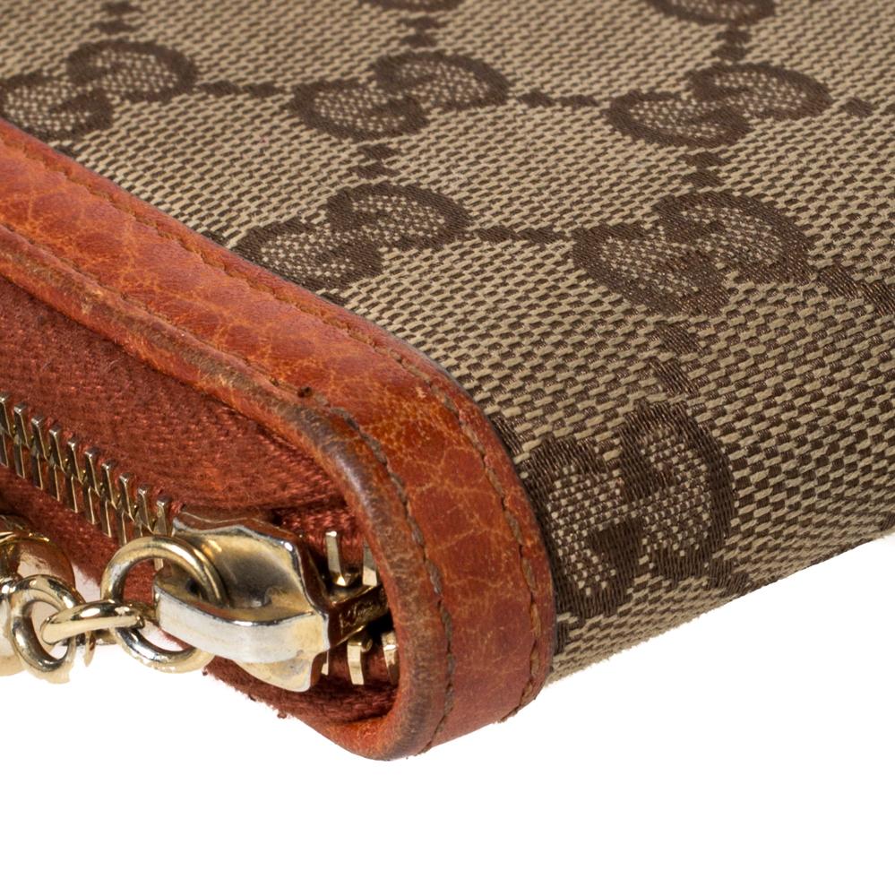 Women's Gucci Beige/Orange GG Canvas and Leather Tassel Zip-around Continental Wallet