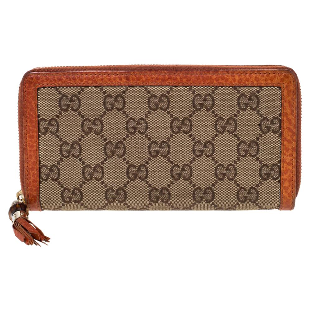 Gucci Beige/Orange GG Canvas and Leather Tassel Zip-around Continental Wallet