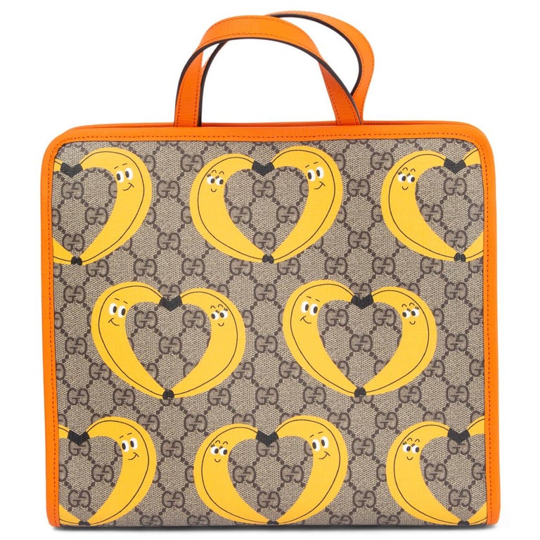 GUCCI - Sac fourre-tout « BANANA PRINT » en toile beige et orange GG Supreme  En vente sur 1stDibs