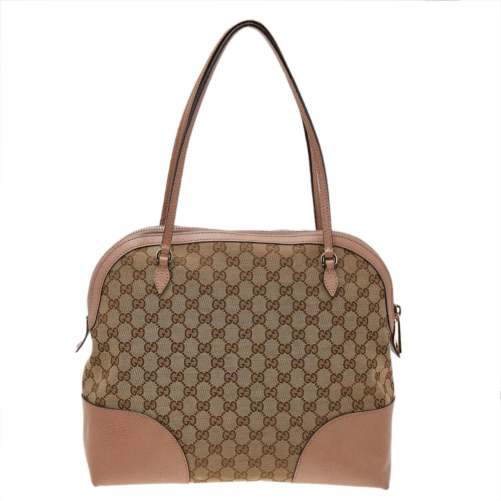 When utility meets high style, we get this Gucci Bree bag. Crafted from signature GG canvas and leather, this bag features two shoulder handles and a spacious fabric interior to house the things you need. This classic bag can be used day or