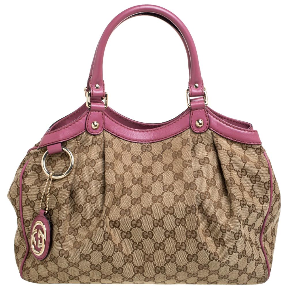 Sold at Auction: A GUCCI PURPLE BLUE MONOGRAM TOTE BAG IN PVC LEATHER