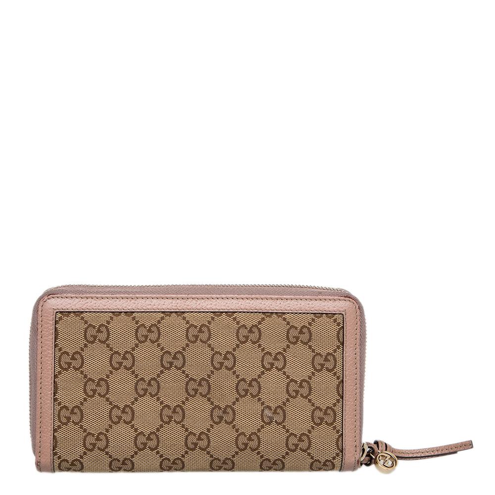 This wallet from Gucci has the instant look of luxury. It is crafted from GG canvas as well as pink leather and designed as a zip-around with multiple slots and compartments for your cards and bills.

Includes: Original Box
