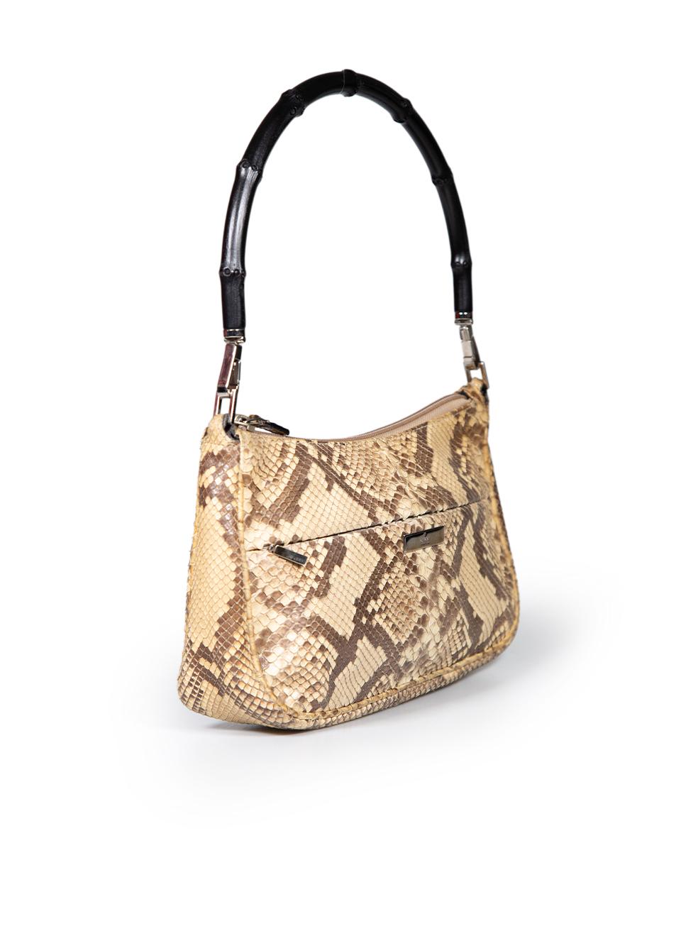 CONDITION is Very good. Minimal wear to bag is evident. Minimal wear to handle bases and general structure of bag on this used Gucci designer resale item. This item comes with original dust bag.
 
 
 
 Details
 
 
 Beige
 
 Snakeskin
 
 Medium top