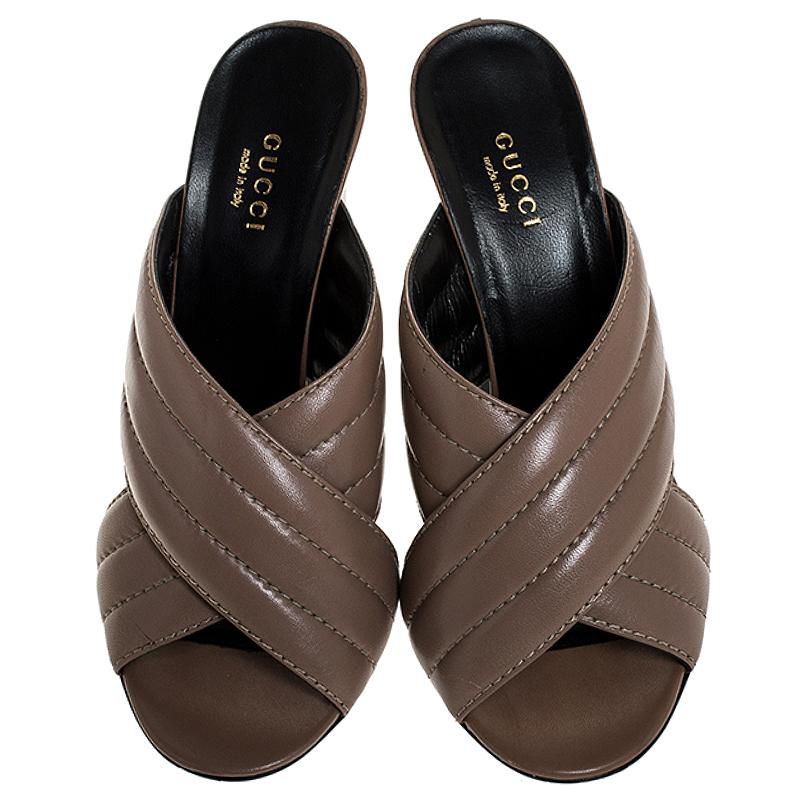 Gucci Beige Quilted Leather Sylvia Crossover Mules Size 38.5 In Good Condition In Dubai, Al Qouz 2