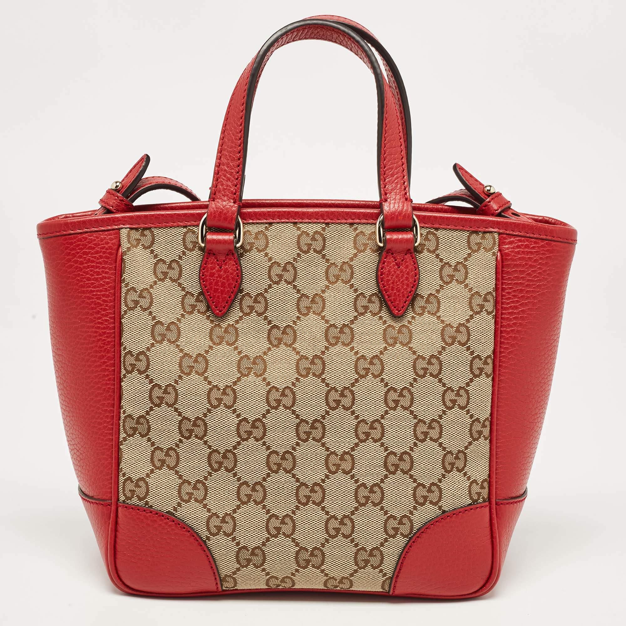 Designed to deliver style and functionality, this tote bag by Gucci has been crafted from GG canvas and leather. It features dual handles, a spacious interior, and gold-tone hardware. It is great for everyday use.

Includes: Original Dustbag,