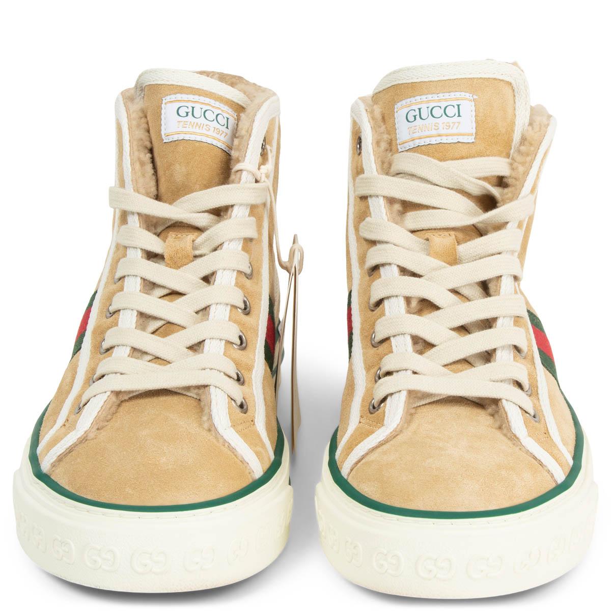 100% authentic Gucci Tennis 1977 high-top sneakers in beige suede with signature web stripe in green and red on the side. White rubber sole and fully lined in beige soft shearling. Brand new. Come with dust bags and extra laces.