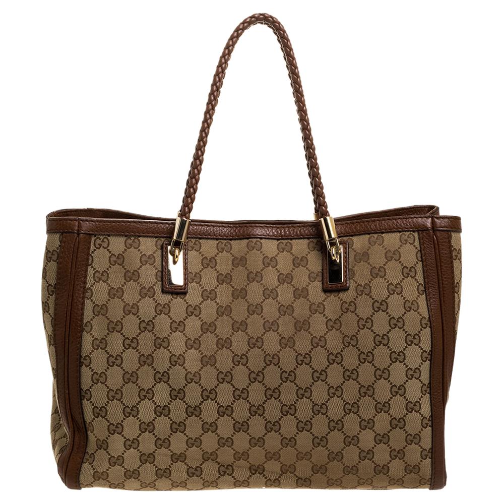 This tote from the house of Gucci is something you would love choosing season after season. It has been crafted from GG canvas as well as leather and features a grand design. It comes with woven handles, bow detailing and a spacious interior that