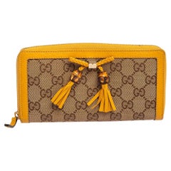 Gucci Beige/Yellow GG Canvas and Leather Bamboo Tassel Bow Zip Around Wallet