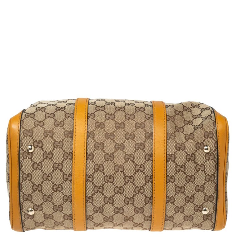 Gucci GG Medium Boston Tasche aus Segeltuch und Leder in Beige/Gelb im  Angebot bei 1stDibs