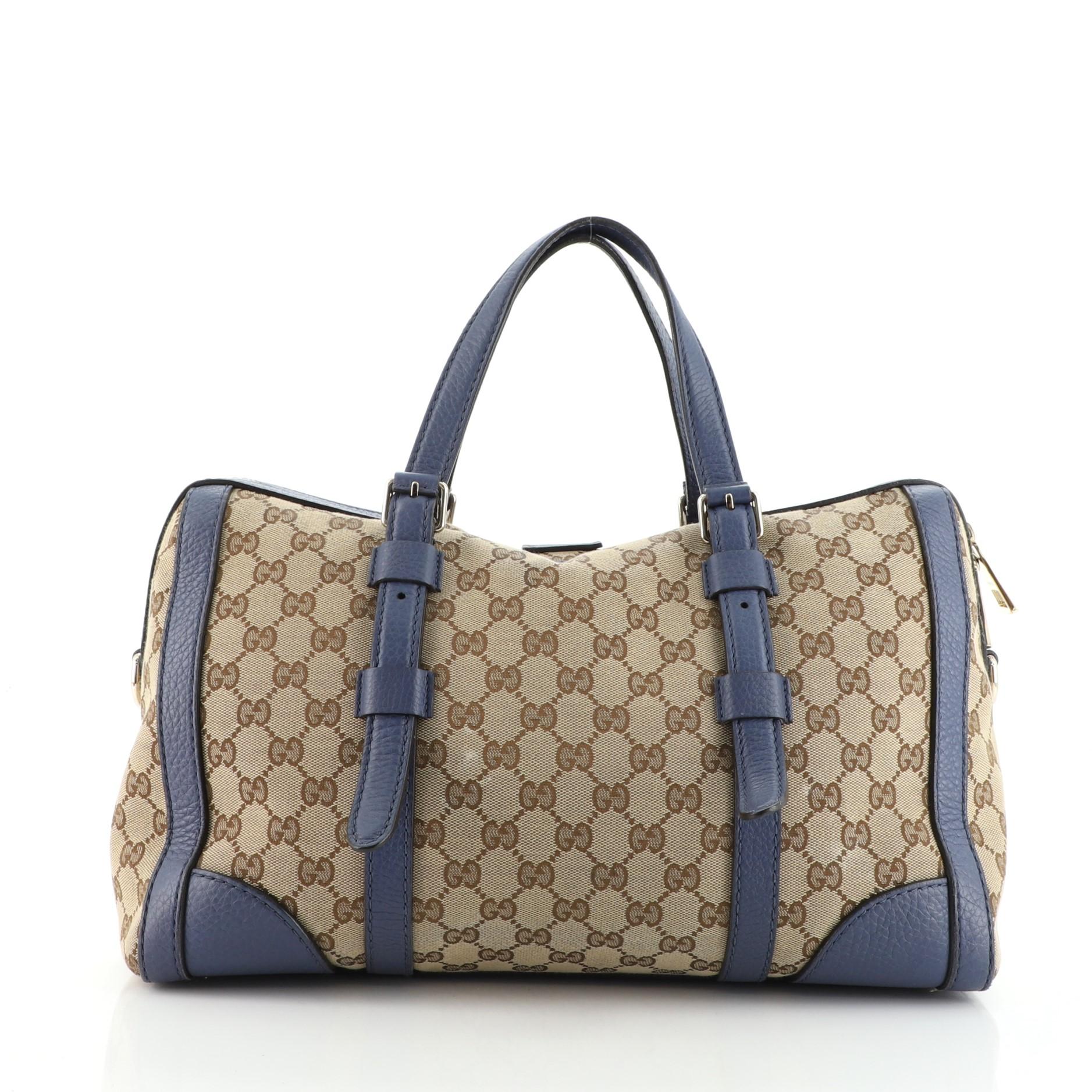 Gucci belted bag top