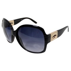 Lunettes de soleil oversize rondes GG en acétate et en or de Gucci circa Y2K