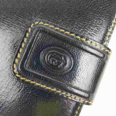 Agenda Gucci noir avec couverture en cuir pour stylo de bureau 872896