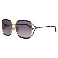 Gucci, schwarze und goldene Sonnenbrille mit quadratischem Rahmen