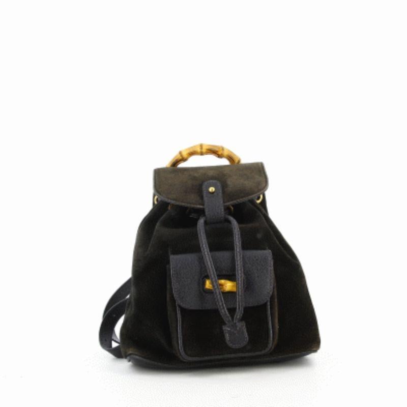 Gucci Black Bamboo Backpack

Very good condition show some light signs of use and wear. A must have in your closet !
Black velvet with bamboo handle, silver tone metal hardware
Packaging:  Opulence Vintage dust bag

Addiional information:
Designer: