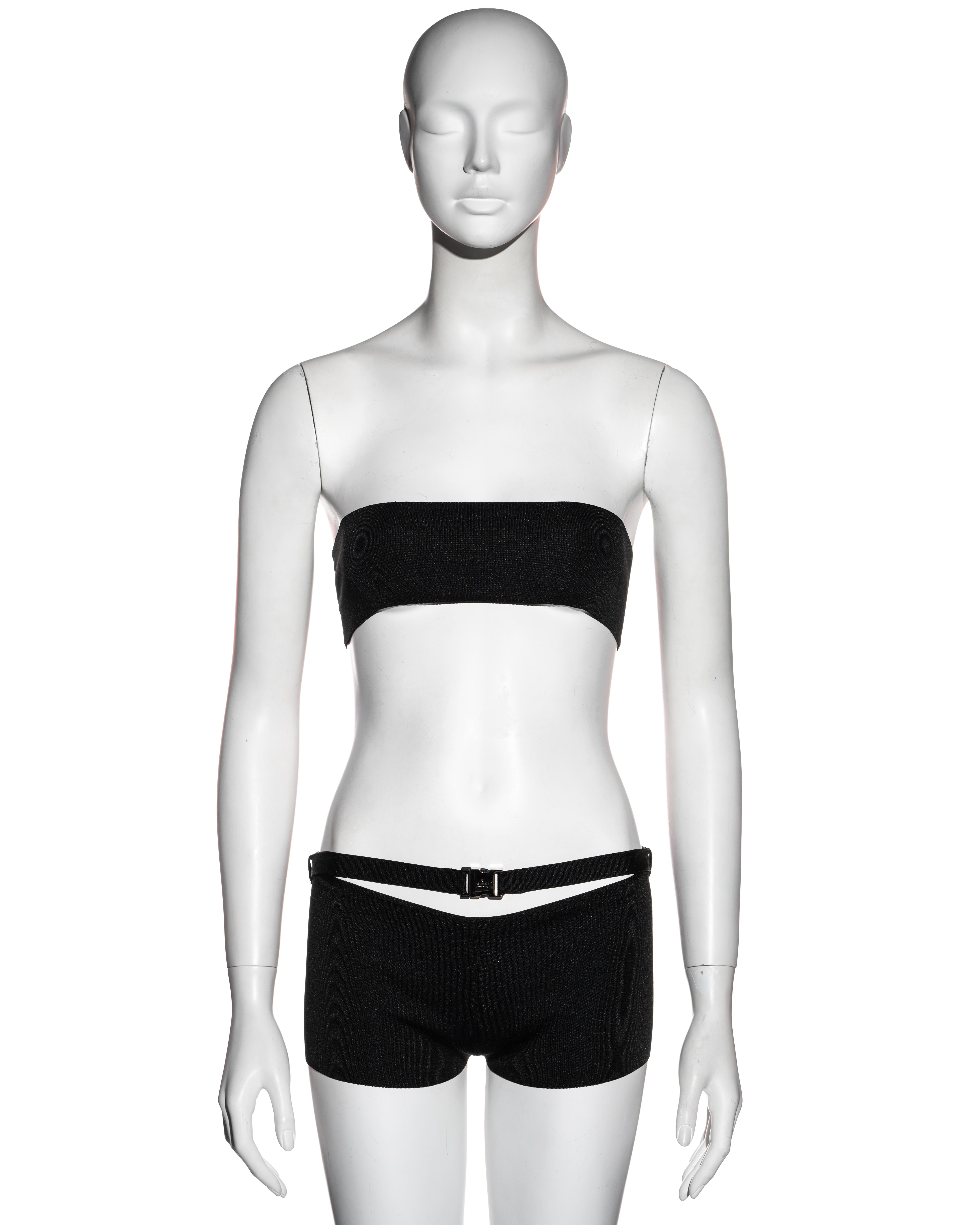 ▪ Gucci black 2 piece resort set 
▪ Bandeau tube top 
▪ Hot pants / mini shorts 
▪ Silver metal clip buckle with 'Gucci' engraving 
▪ Size Small 
▪ Resort 2010