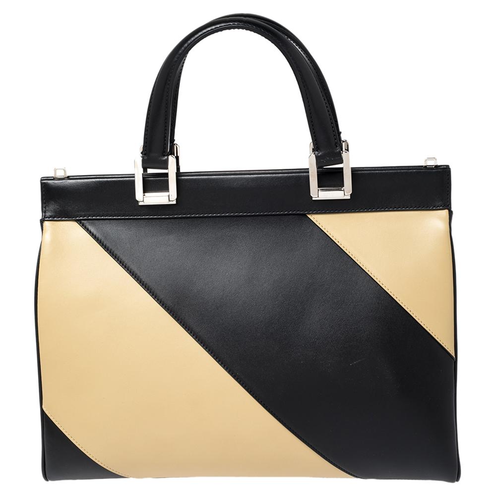 The Zumi line from Gucci is named after actress & musician Zumi Rosow. This bag merges two distinctive signatures—the interlocking GG logo and the Horsebit—to deliver a signature look that is chic and unexpected. The bag is crafted from black and