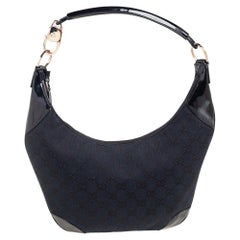Gucci Hobo aus schwarzem/blauem GG-Segeltuch und Lackleder