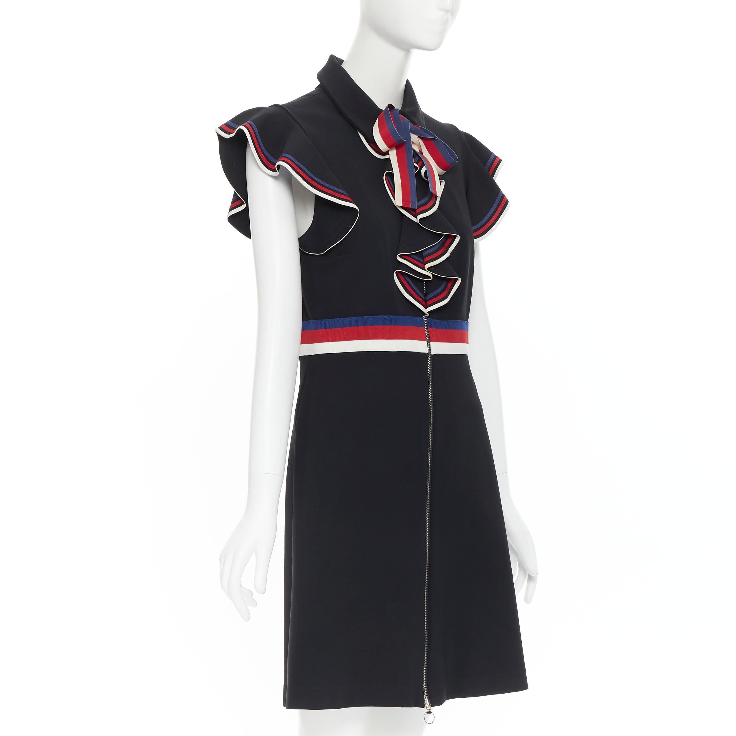 GUCCI black blue red white web ribbon bow flutter sleeve cocktail dress XL Reference: CAKK/A00014 
Brand: Gucci 
Designer: Alessandro Michele 
Material: Viscose 
Color: Black 
Pattern: Solid 
Closure: Zip 
Extra Detail: Red blue white web trimming.