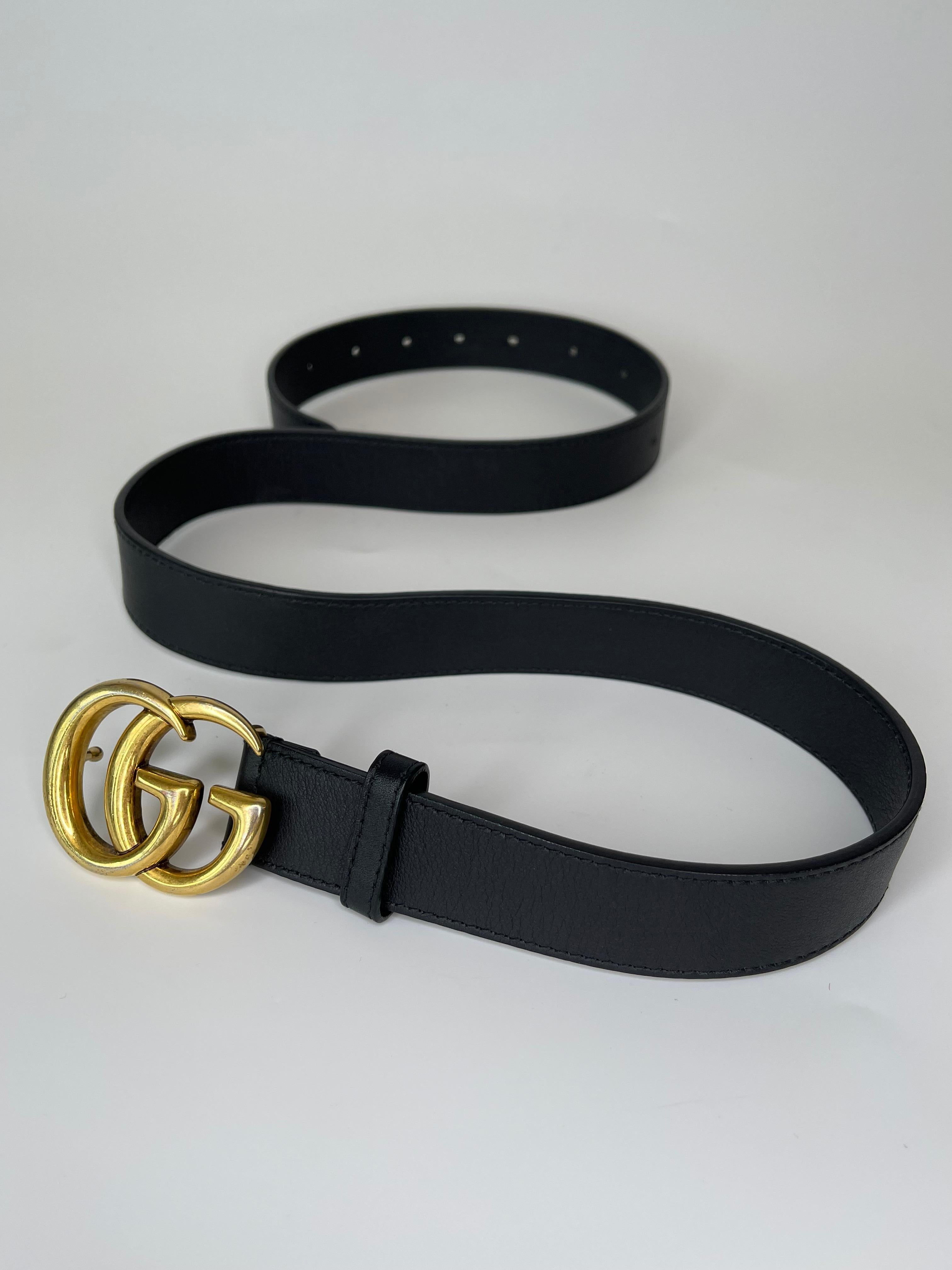 This belt is made of calfskin leather in black and features an aged gold tone  interlocking GG buckle.

COLOR: Black
HARDWARE: Gold tone
ITEM CODE: 414516 APOOT 480199
MATERIAL: Leather
SIZE: 90/36
COMES WITH: Original box
CONDITION: Good condition,