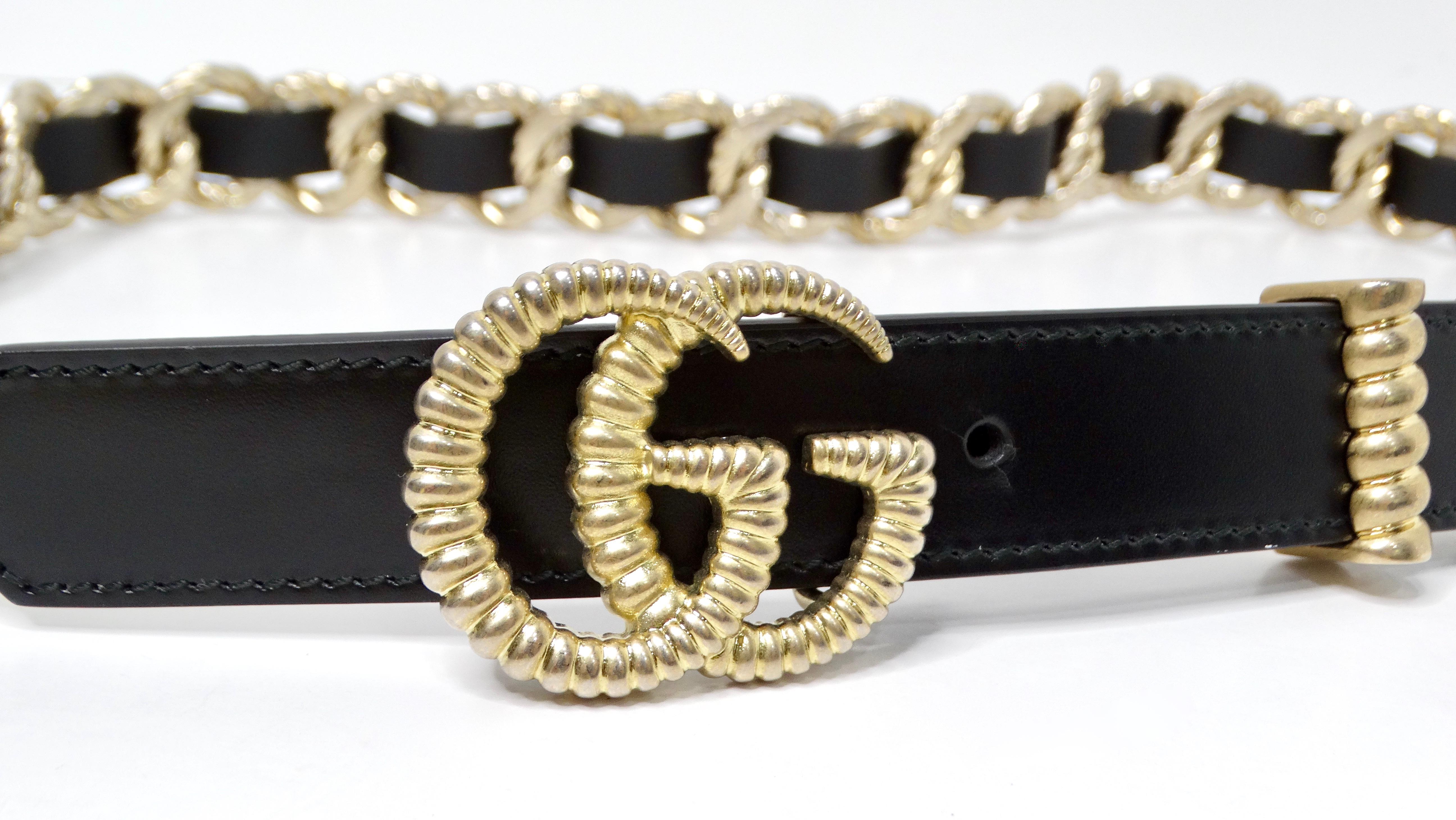 Introducing the Gucci Black Calfskin Leather Double G Logo Champagne Gold Tone Belt, a striking accessory that embodies the luxury and sophistication of the iconic Gucci brand. Crafted from premium black calfskin leather, this belt features a