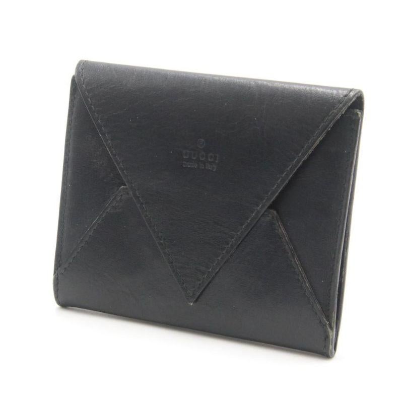 Gucci Black Calfskin Leather Envelope Pocket Card Holder Wallet

This stunning pouch is a must have for all Gucci lovers. This pocket card holder is crafted out of smooth leather with an envelope top closure. The exterior is worn with corner edge
