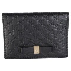 Gucci Black Calfskin Microguccissima Bow Card Holder